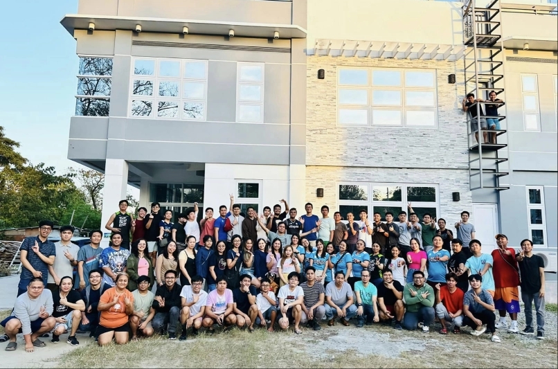 2024 team photo outside the V88 Building, Philippines.